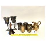 Group lot includes a brass bell, some silverplate