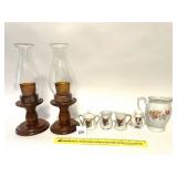 A decor lot includes candle holders, a set of