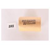 Roll of Kennedy Half Dollars, ranging from 65 to