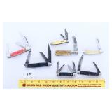 A group lot of pocket knives the majority are