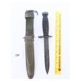 A bayonet with scabbard. The scabbard is marked