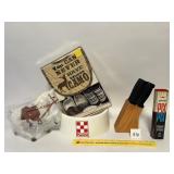 A knife set, a toy horse and other items. Located