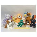 A group lot of plush stuffed animals. Some are