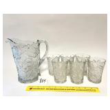A vintage glass or possibly crystal pitcher with
