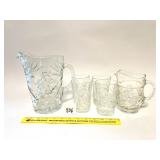 A star of David pitcher and four cups also