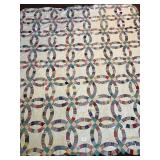 A double wedding ring quilt top. It measures