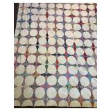 A vintage quilt top. It measures approximately 68