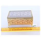 A small vintage jewelry box