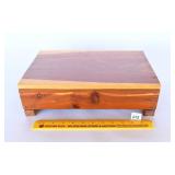 A vintage cedar box. The lid is not hinged