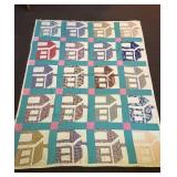 a vintage hand-stitched quilt. It does have some