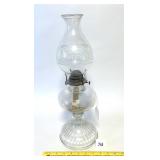 An antique Oil Lamp - Located in Dining Room