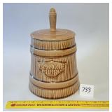 A vintage cookie churn cookie jar unmarked.