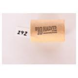 Roll of Kennedy Half Dollars, ranging from 65 to