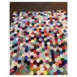 A vintage quilt top. Measures approx. 76 x 87