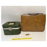 A vintage green suitcase and a vintage American