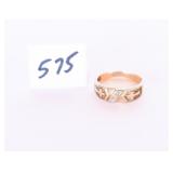 A cross ring it is marked 10K it appears to have