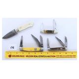 Four pocket knives, a Damascus blade fixed blade