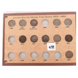 A collection of shield nickels. 1866, 1867 with