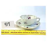 Cup with Saucer and Stand - there are some chips