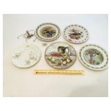 (5) Decorative Plates and a few plate hangers -