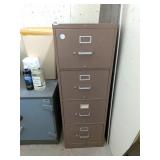 Metal Filing Cabinet     Located in Basement