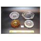 (4) Glass Ashtrays    Located in Kitchen