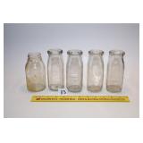 Group of 1/2 Pint Milk Bottles    Located in