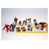 Assortment of small toys including Transformers,