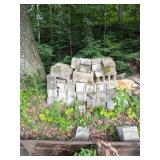 Group lot of concrete blocks     Located behind