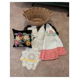 Group of vintage decor including tablecloths,