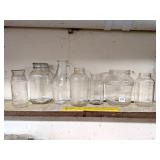 Group lot of various size glass jars     Located