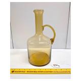 Amber glass pitcher     Located in Basement