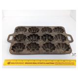 Cast Iron Muffin Pan     Located in Basement