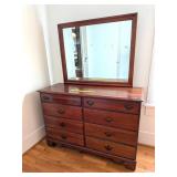 Dresser w/ mirror; measures approx. 50 in W x 18