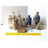 Small Vintage Glass Bottles      Located in