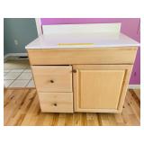 Cabinet with White Countertop - The top is