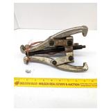 Trip Arm Puller