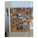 Assortment of Garage Items on Peg Board