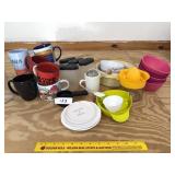 Assortment of kitchen items: mugs, small storage