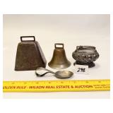 Group lot: cattle bell, another small bell, a