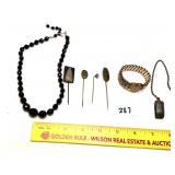 Group lot of vintage jewelry including stick pins