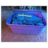 Tote of Plastic Tarps        Located in Garage 1