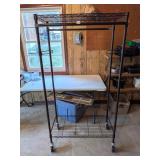 Rolling Clothing Rack        Located in Garage 2