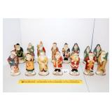 Group of Ceramic International Santas