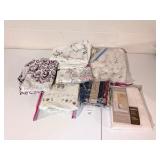 Group of fabric shower curtains         Located