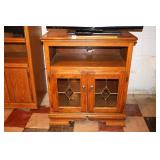 Wooden TV Stand; TV not included        Located