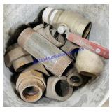 Bucket of Large Pipe Fittings