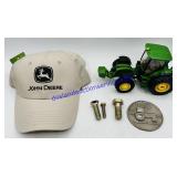 John Deere Hat, Bolts, Medallion And Toy Tractor.