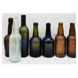 7 Antique Iowan Soda Bottles (Sioux City,