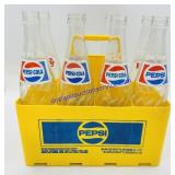 8 Pepsi Bottles w/ Plastic Carrying Case